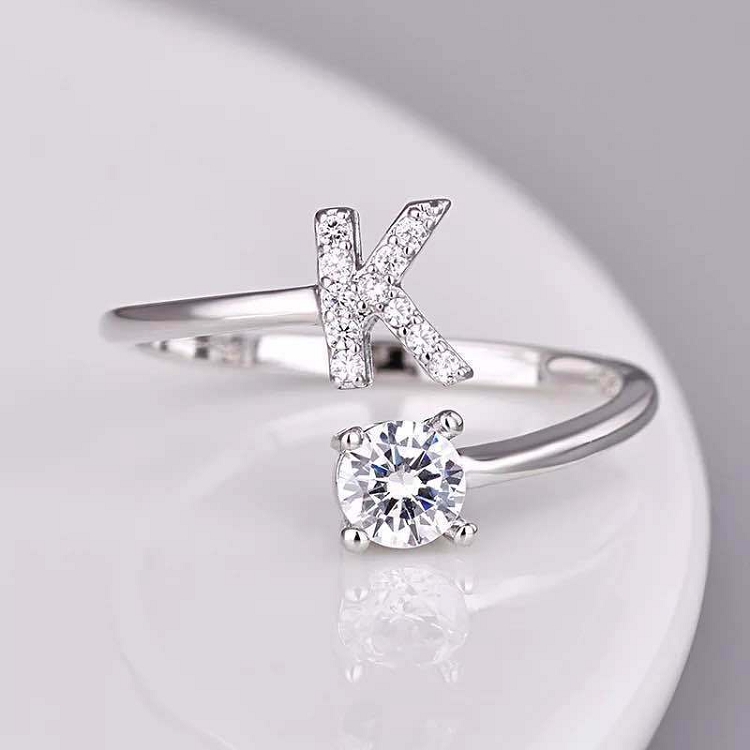 Student creative simple combination new 26 English letter style diamond ring with open ring ?